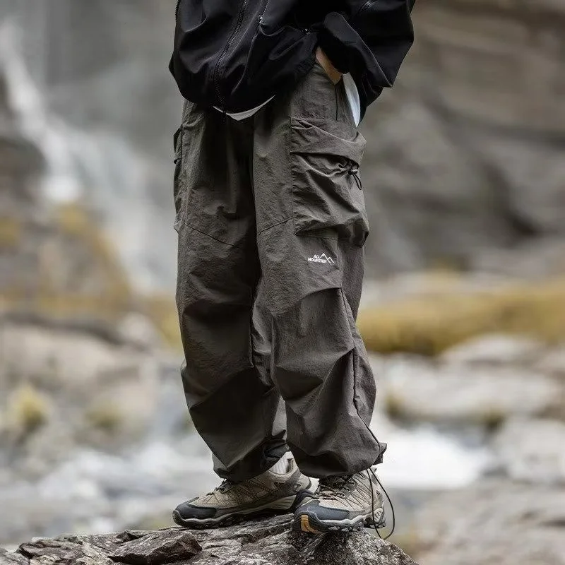 American Casual Outdoor Charging Pants Men's Solid Drawstring Pockets Windproof Waterproof Loose Ankle Sports Hiking Trousers